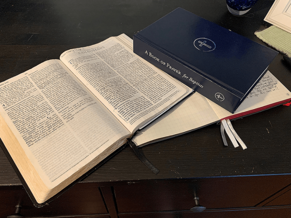 open bible, open journal, and A Book of Prayer for Baptists